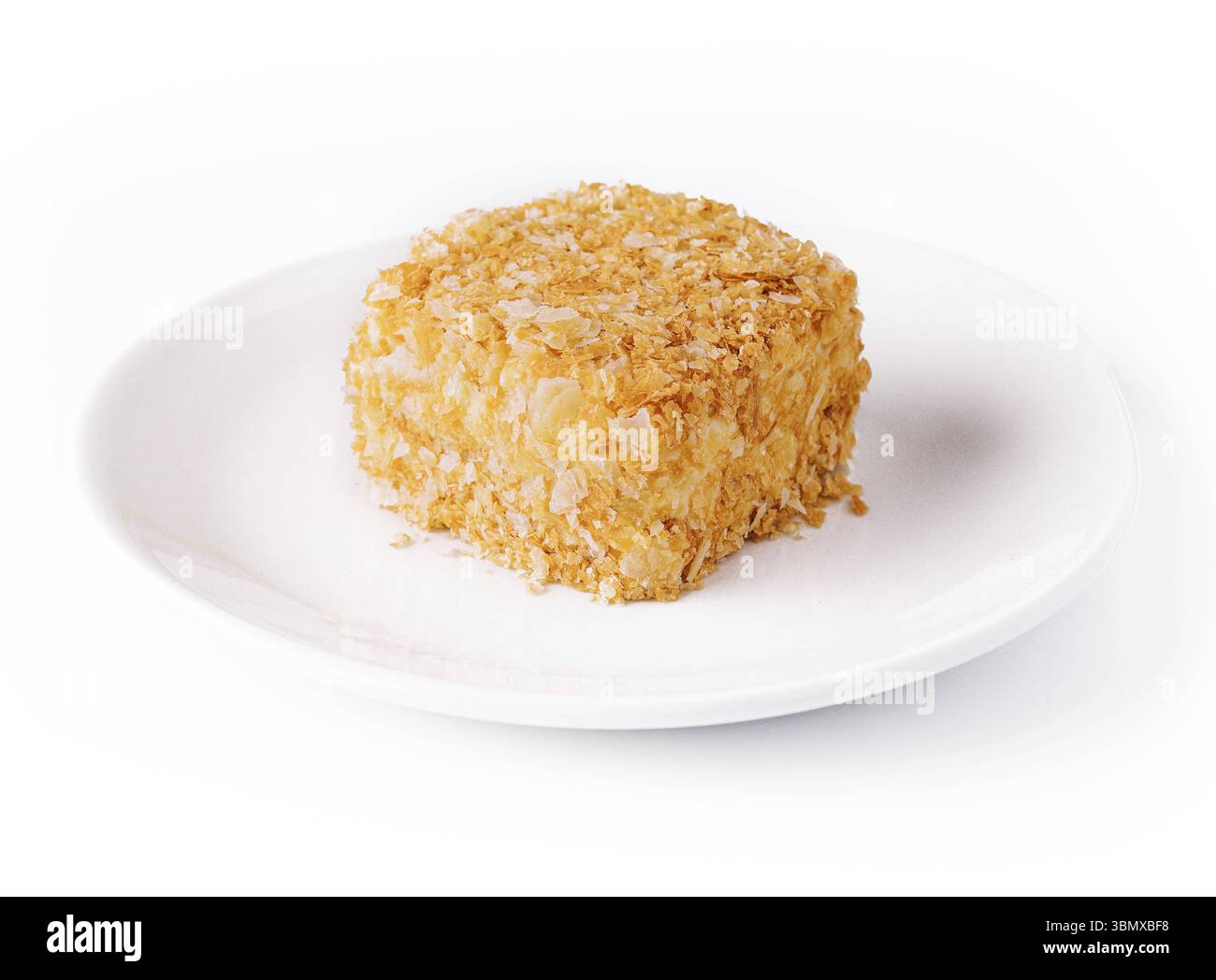 Cibo natura morta, torta fatta in casa Napoleone sul piatto Foto Stock