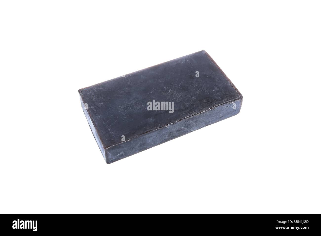 è un sapone di fango nero isolato su bianco. Foto Stock