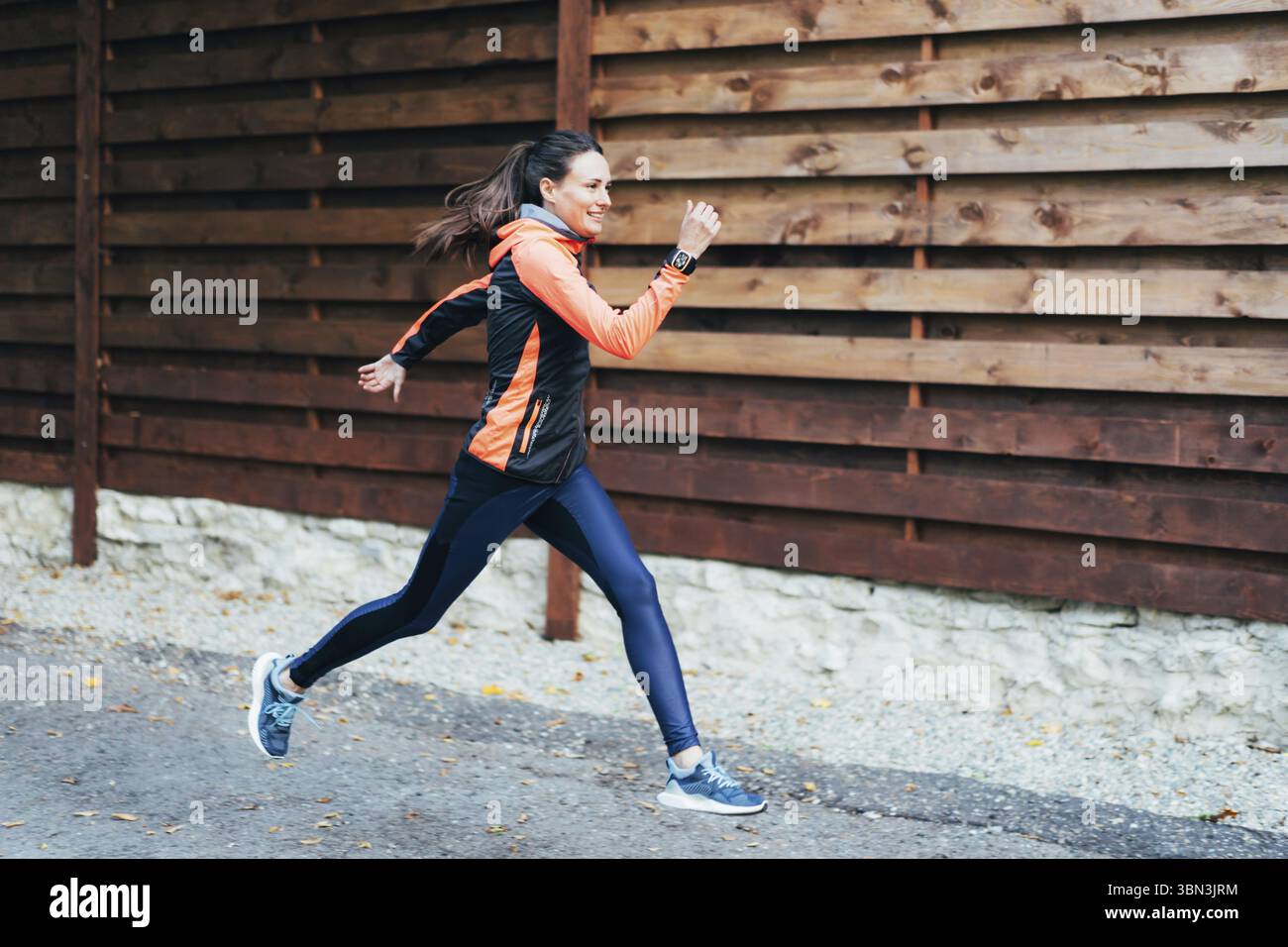 Runner atleta nello sport vestiti in formazione Foto Stock
