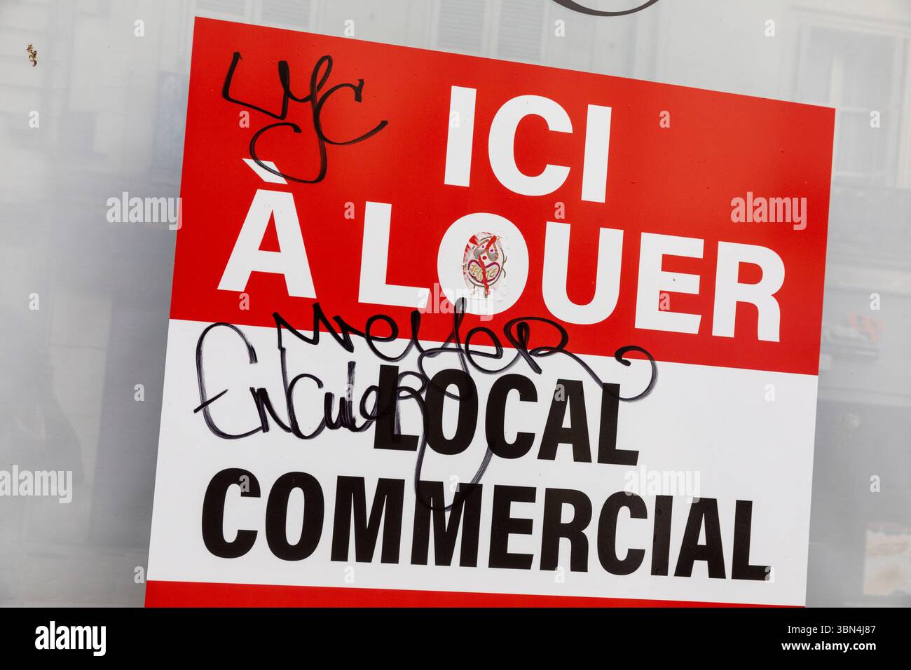 Taquet firma dove dice. qui in affitto locali commerciali. Foto Stock