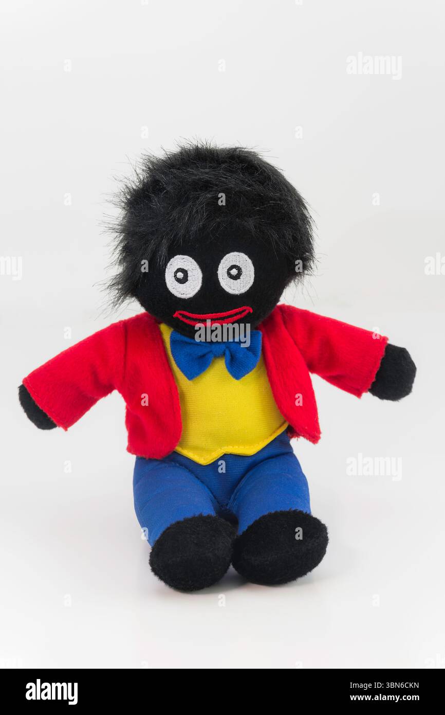 Una classica bambola golliwog del tipo creata da Florence Kate Upton. Foto Stock