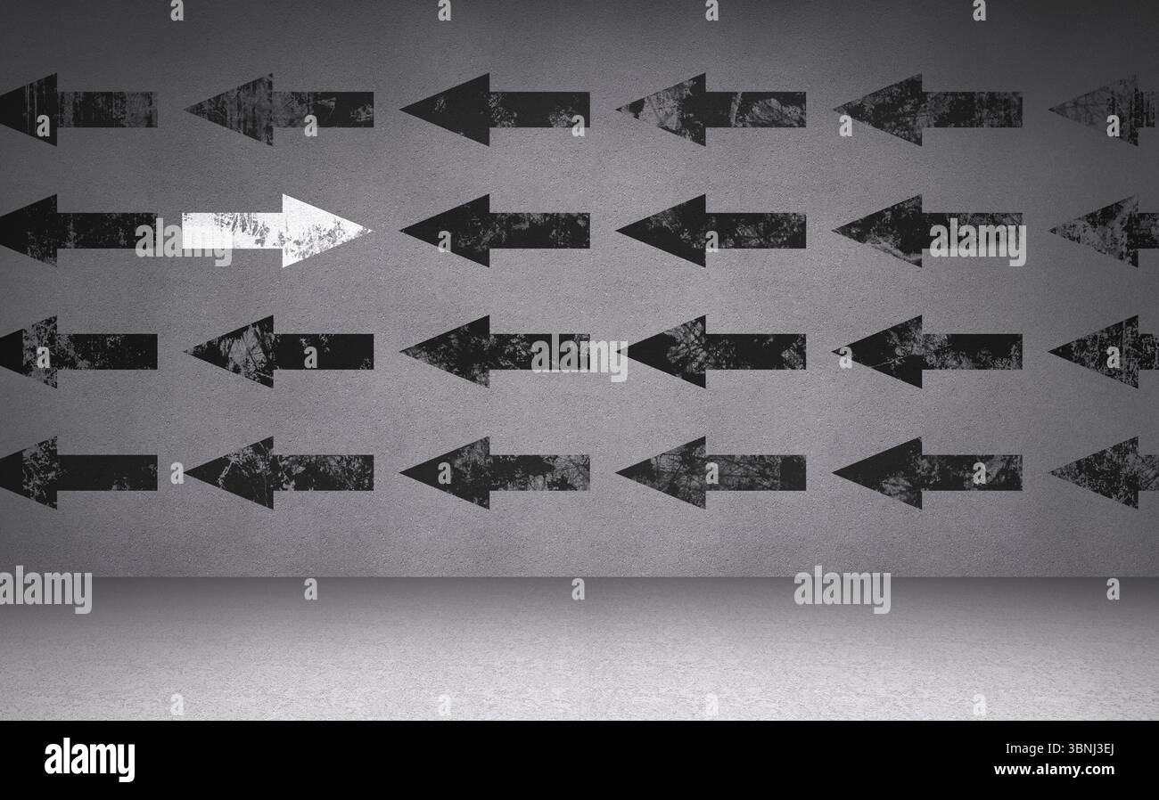 Frecce bianche e nere sulla parete Foto Stock