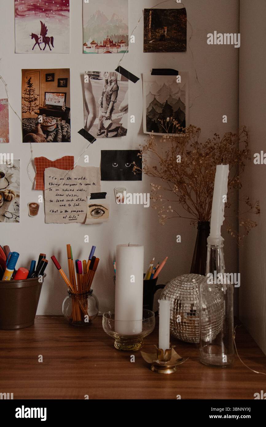 Dark Academia Still Life of Candles and Dried Flowers Foto Stock