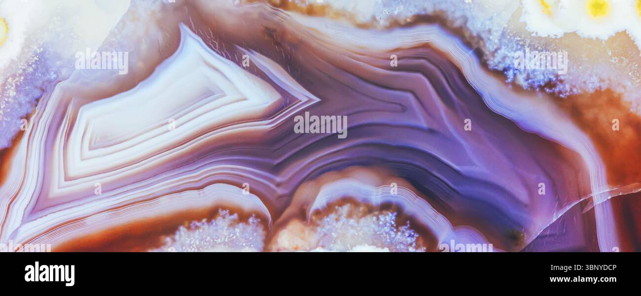 Splendido sfondo panoramico multicolore con pietra di agata semipreziosa Foto Stock