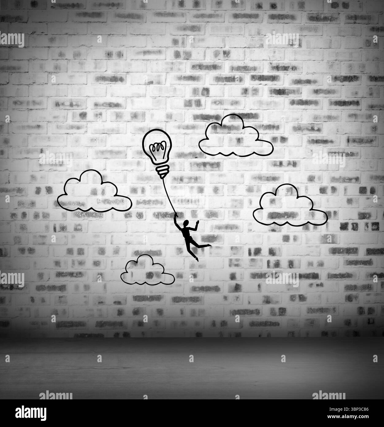 La lampadina della luce nel grafico vuoto camera grigia Foto Stock