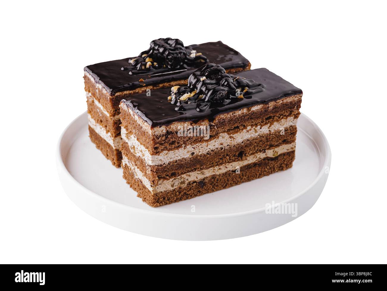 Cibo, due fette di ricca torta al cioccolato ricoperta di glassa lucida e trucioli Foto Stock