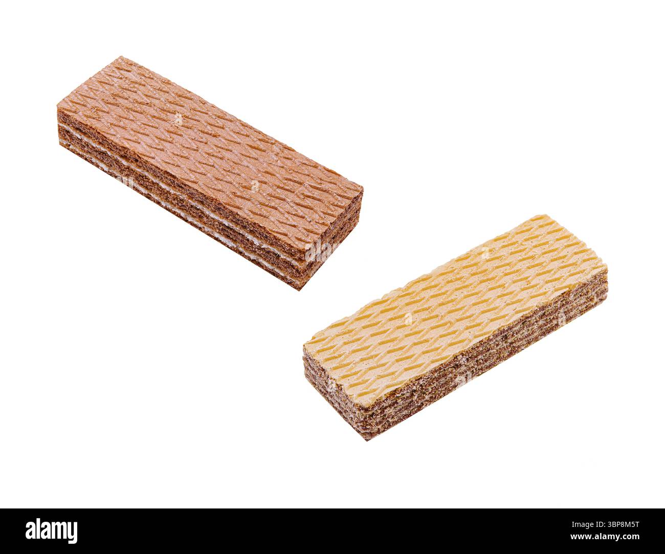 Cibo, due wafer rettangolari mostrano sapori contrastanti con una superficie ruvida. Un wafer è marrone mentre l'altro è giallo, seduto fianco a fianco Foto Stock