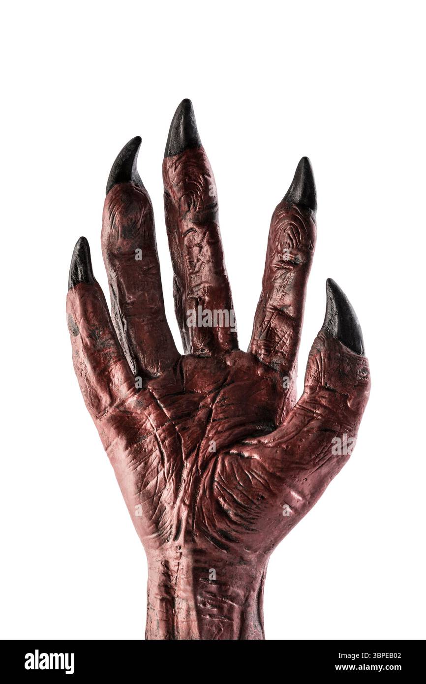 Mano del mostro del diavolo rosso isolata su sfondo bianco con percorso di ritaglio Foto Stock