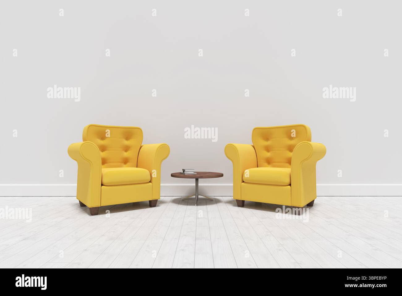 Poltrone gialle con tavolo contro la parete Foto Stock
