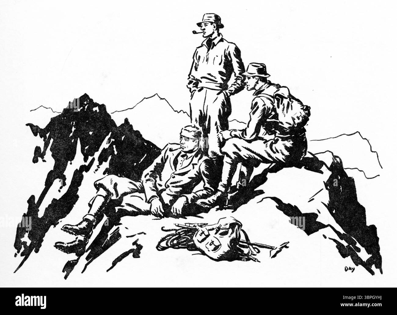 tre alpinisti si riposano sulla cima della montagna che hanno appena scalato Foto Stock