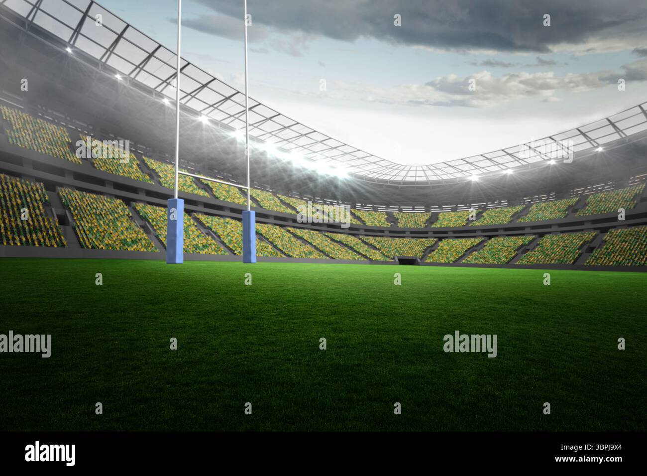 Lo stadio di rugby piatto e vuoto mostra un campo di erba, pali di porta bianchi con imbottitura blu, proiettori Foto Stock