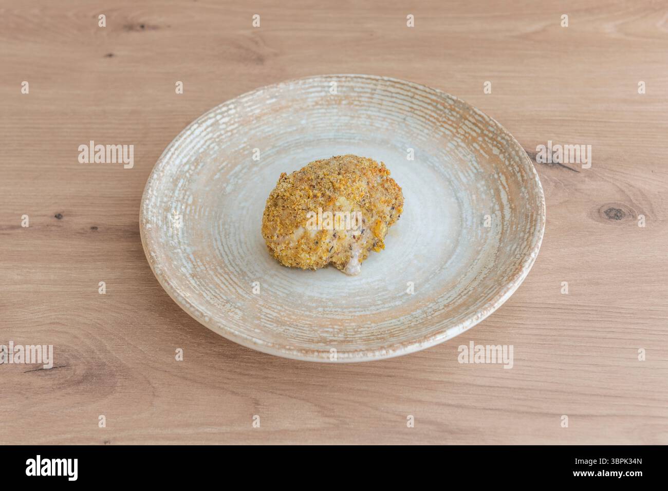 La creatività nei ripieni arancini è illimitata e riflette la ricchezza della dispensa siciliana Foto Stock