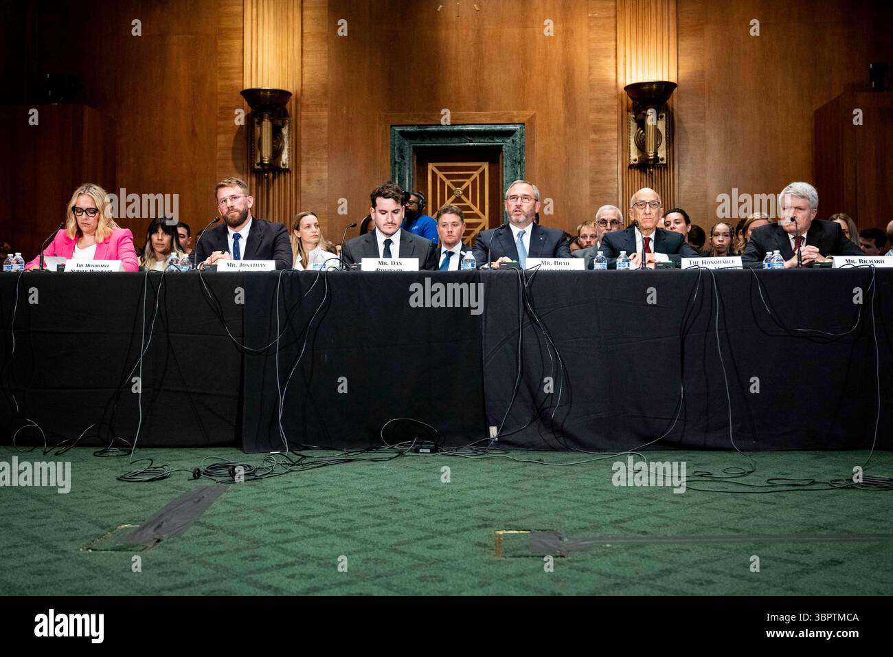 9 luglio 2025, Washington, District of Columbia, USA: SUMMER MERSINGER, CEO, Blockchain Association; Mr. JONATHAN LEVIN, CEO, Chainalysis; DAN ROBINSON, General Partner, Paradigm; BRAD GARLINGHOUSE (parlando), CEO, Ripple, TIMOTHY MASSAD, Research Fellow e Director of Digital Assets Policy Project del Mossavar-Rahmani Center for Business and Government, Kennedy School of Government presso l'Università di Harvard e ex Presidente CFTC, e RICHARD PAINTER, S. Walter Richey Professor of Corporate Law, University of Minnesota Law School, ex consigliere associato del Presidente e capo W Foto Stock