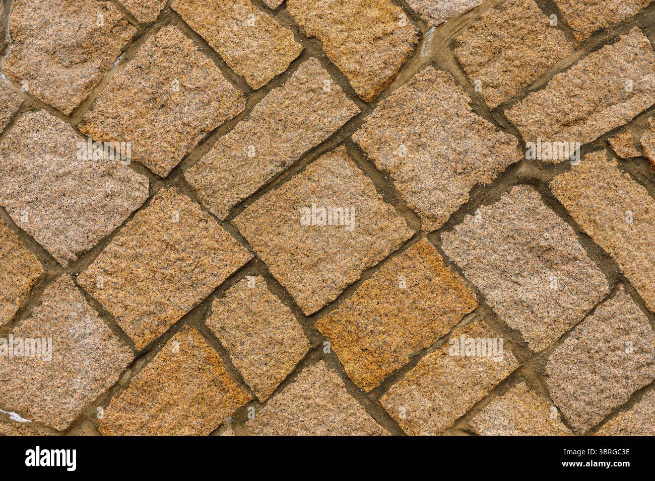 Sfondo testurizzato in pietra naturale. Muro di pietra, struttura di un muro costruito Foto Stock