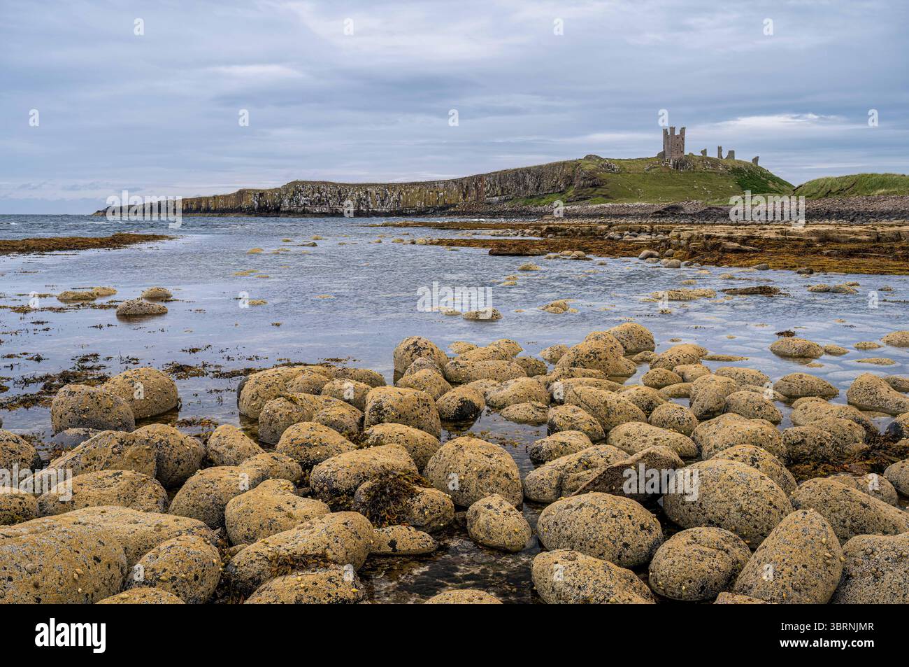 Il castello di Dunstanburgh Foto Stock