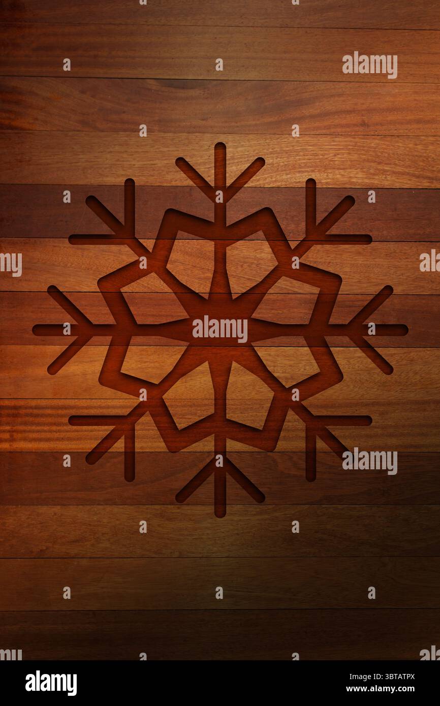Il design a sei punte del fiocco di neve appare in un pannello di legno dal design piatto, con tavole marroni orizzontali Foto Stock