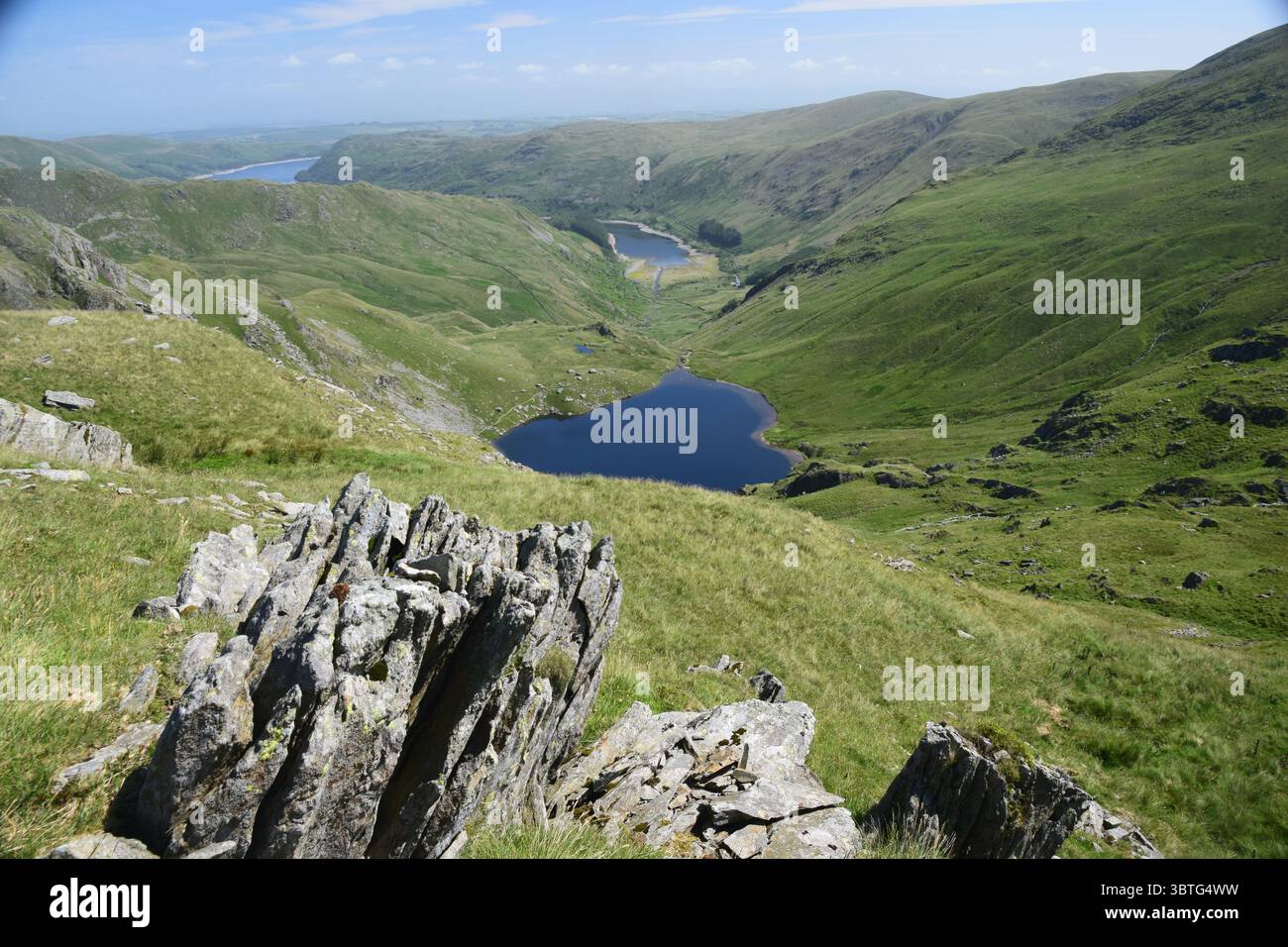 Piccolo tarn d'acqua all'interno di Mardale nel Lake District Foto Stock