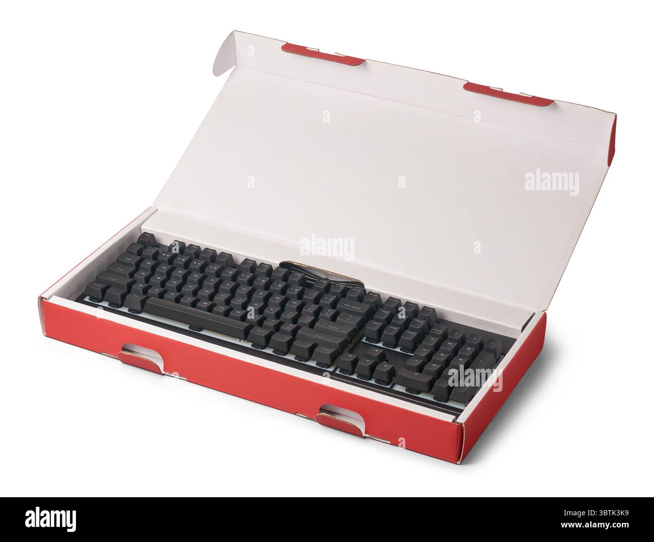 tastiera nera per giochi meccanici in confezione aperta sfondo bianco isolato, modello di hardware per videogame Foto Stock