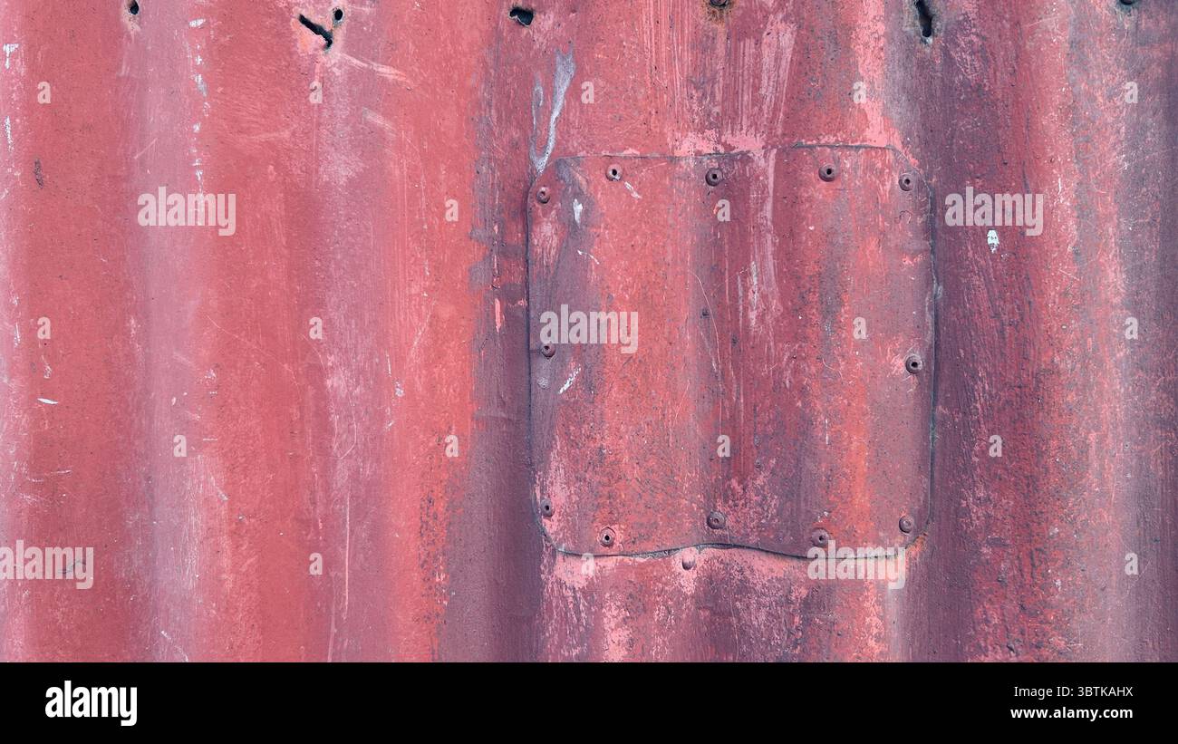 vecchio muro di acciaio rosso Foto Stock
