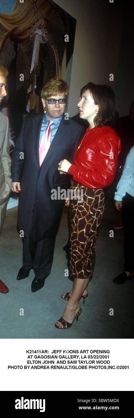 22 MARZO 2001 - K21411AR: APERTURA ARTISTICA DI JEFF KOONS. ALLA GAGOSIAN GALLERY, LA 03/22/2001. ELTON JOHN E SAM TAYLOR WOOD. (Immagine di credito: © Andrea Renault/ZUMA Wire) Foto Stock