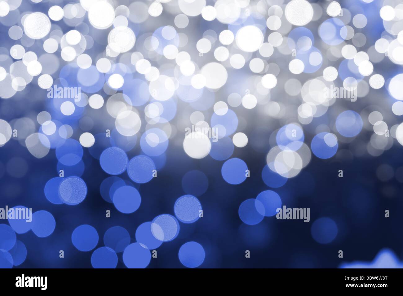 Il design piatto mostra cerchi di luce bokeh bianchi e blu sovrapposti che si illuminano sulla cornice Foto Stock