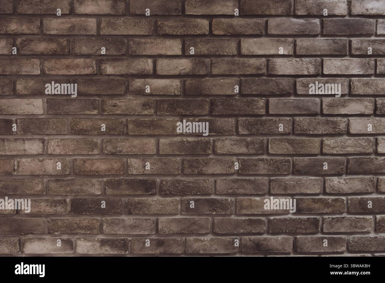 Brown grunge muro di mattoni in background. Texture di sfondo e concetto. Materiale e costruzione del tema. Camera oscura film di tono Foto Stock