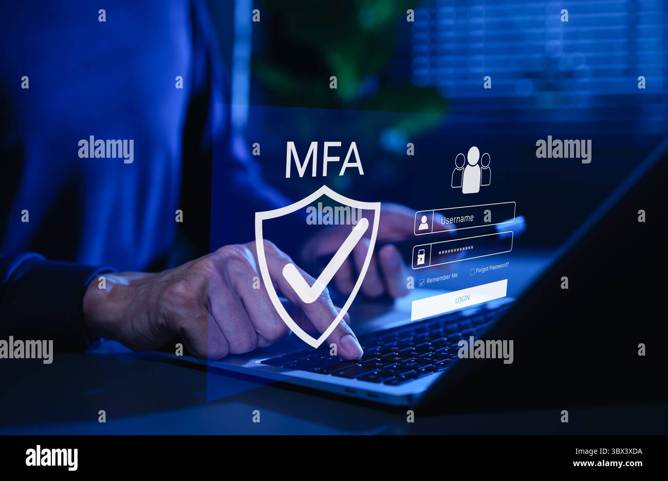 MFA (Multi-Factor Authentication Security Concept). Persona che digita sul laptop con icona di scudo MFA e interfaccia di accesso, autenticazione multifattore Foto Stock