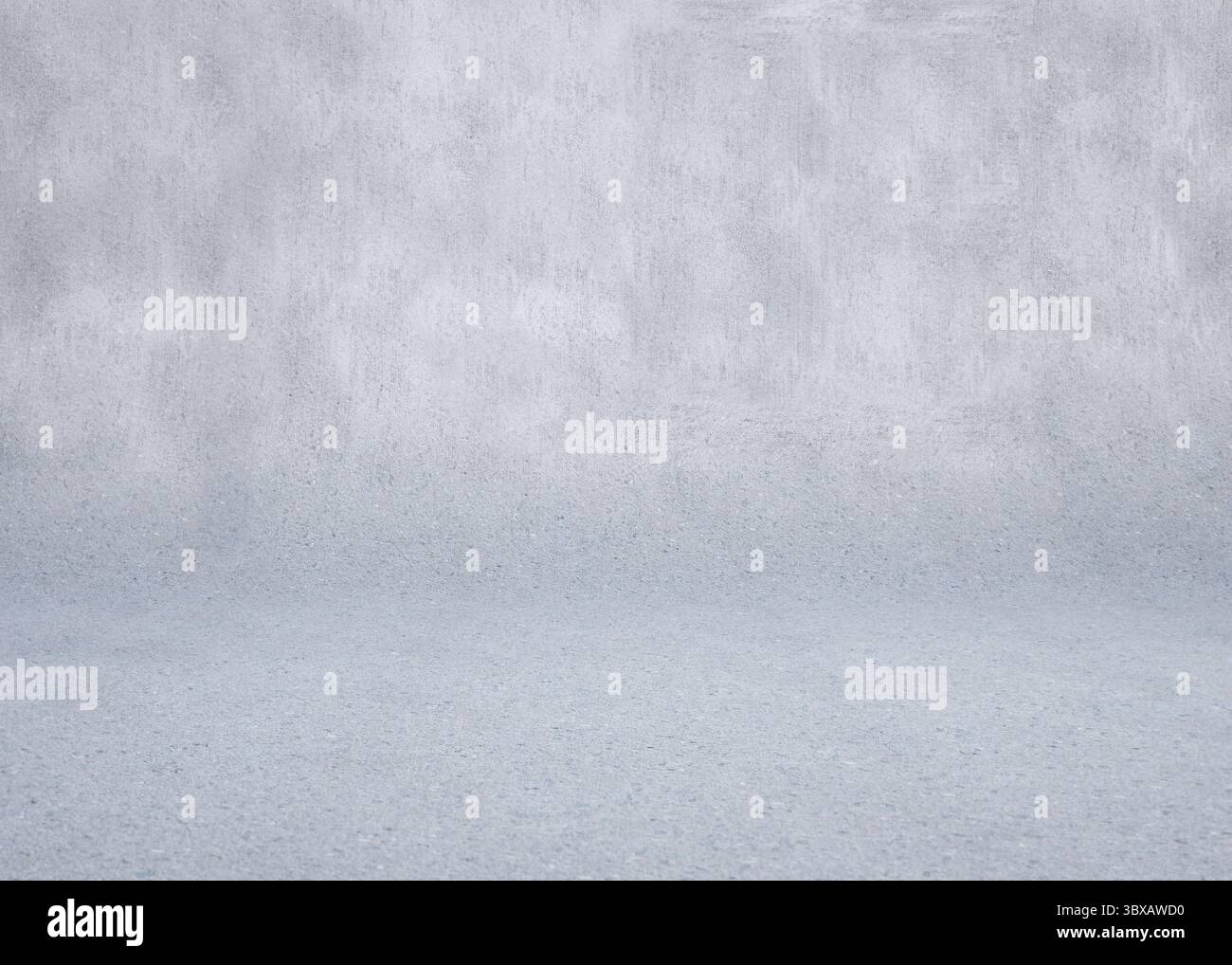 La superficie in calcestruzzo viene mostrata con un design piatto, caratterizzato da una struttura grigia senza cuciture e giunzione curva Foto Stock