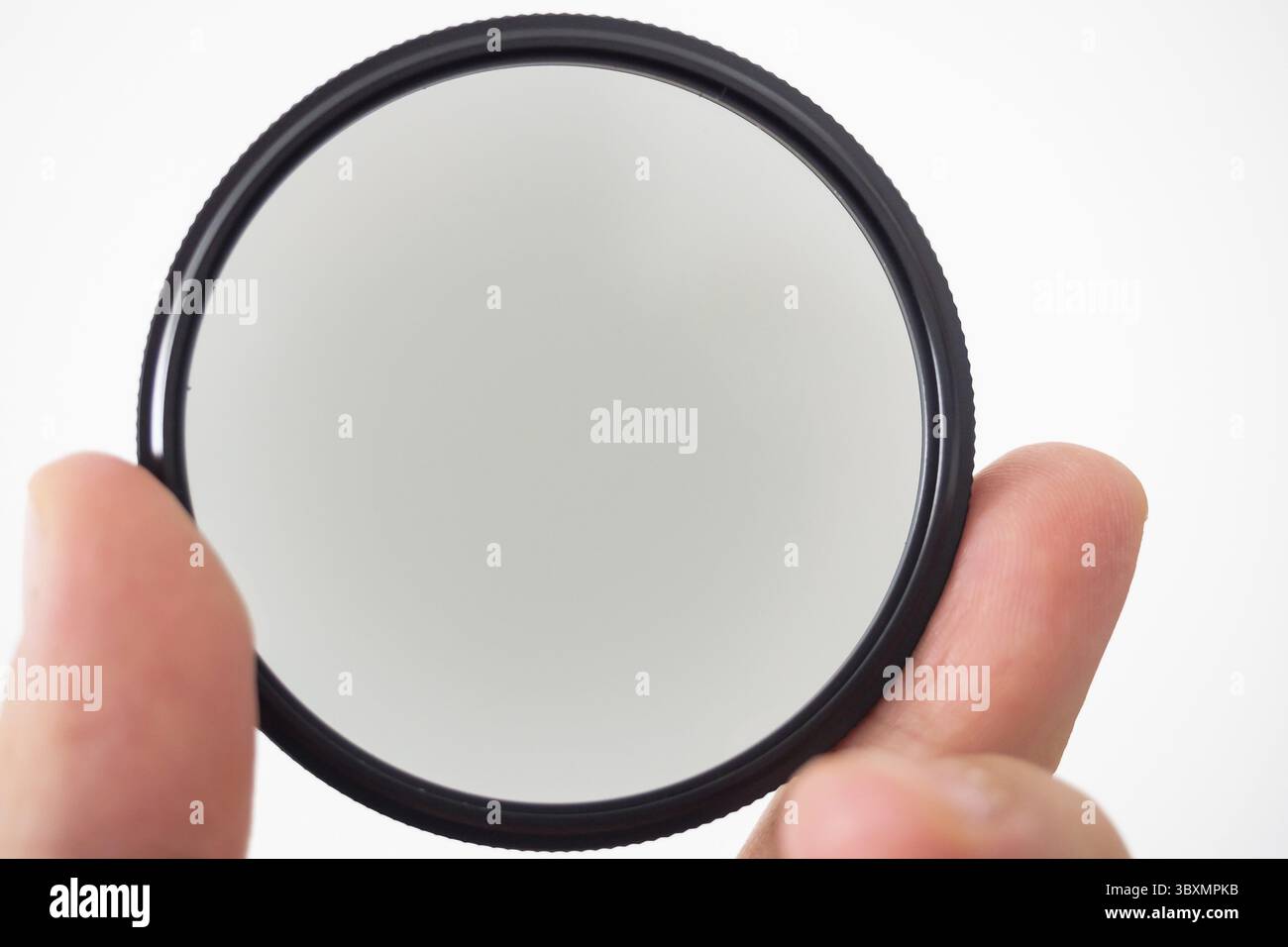 Filtro UV per obiettivo per fotocamera SLR portatile Foto Stock