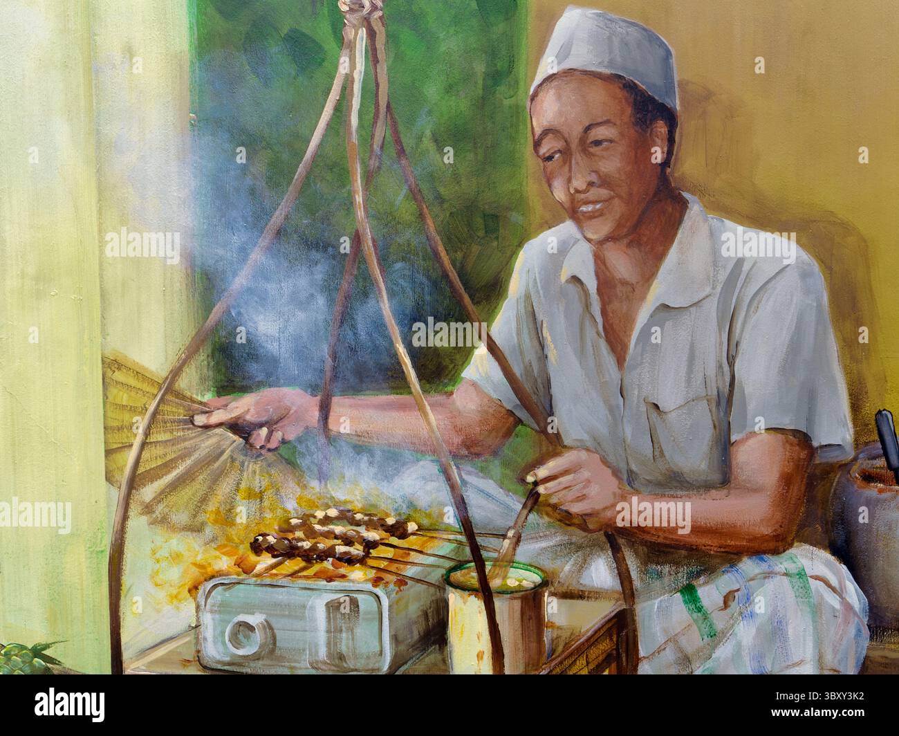 Un murale a Kampong Glam, Singapore, un'area dominata dal malese, raffigurante un uomo malese in tradizionale satay arrosto, cioè carne condita e spiedata Foto Stock
