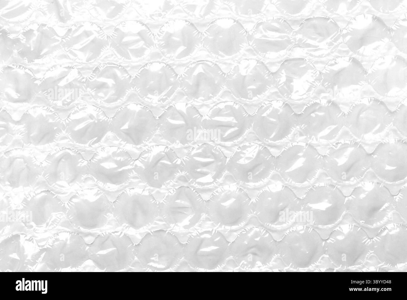 Confezione a bolle d'aria. Materiale protettivo morbido utilizzato. Sfondo astratto bianco Foto Stock