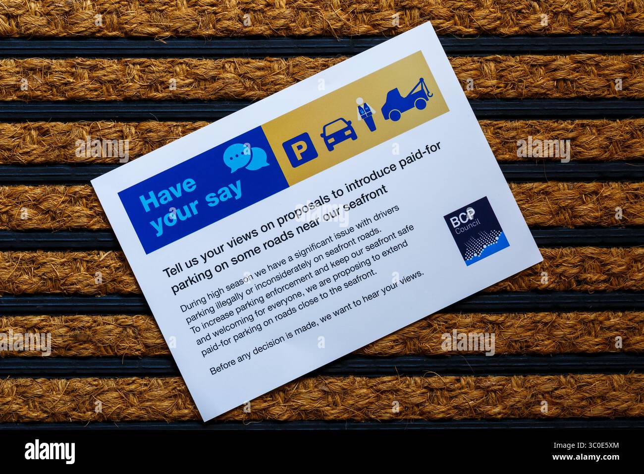 Dite la vostra - proposta di introdurre il parcheggio a pagamento dal BCP Council sul tappetino della porta Foto Stock