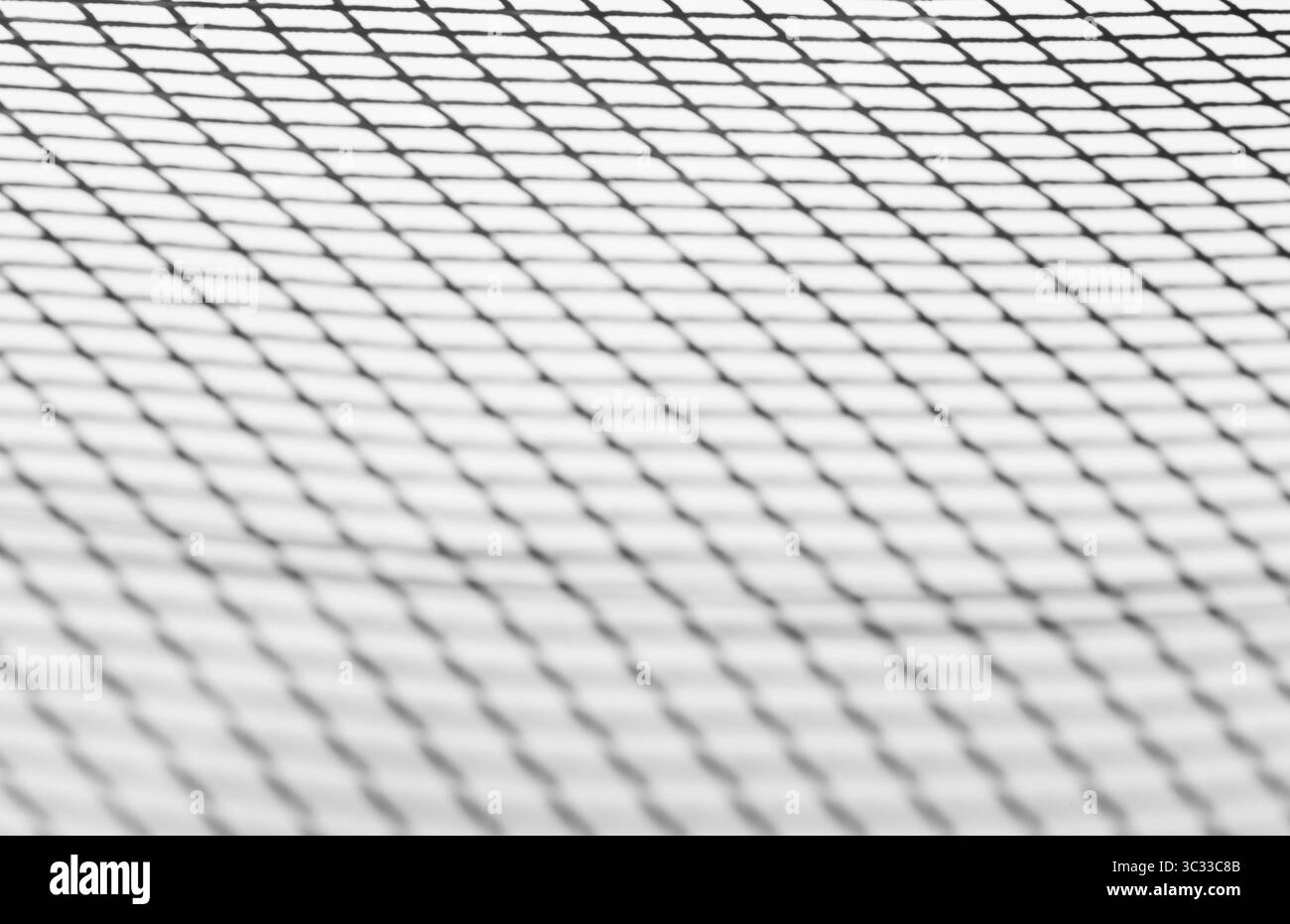 Riflesso della griglia su sfondo bianco. Foto Stock
