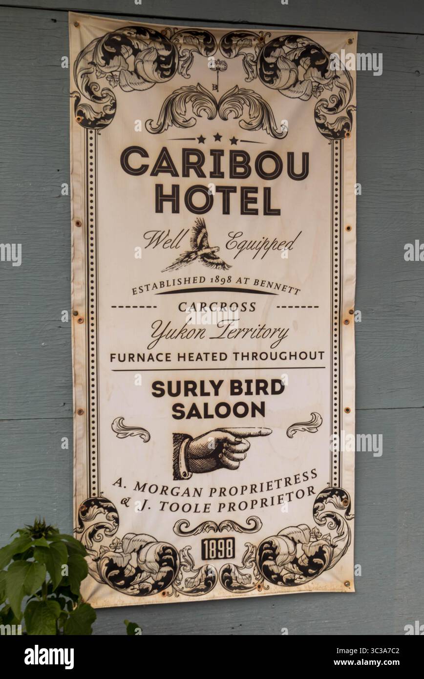 Autentico vecchio poster per lo storico Caribou Hotel a Bennett, Carcross, Yukon. Foto Stock