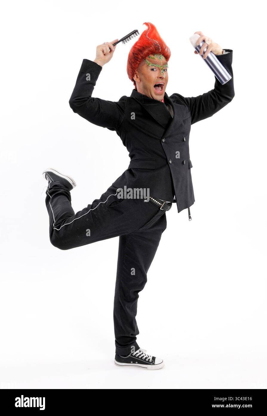 Louie Spence ad un photocall per il National AIDS Trust Wig Party a Londra - 3 ottobre 2010 Foto Stock