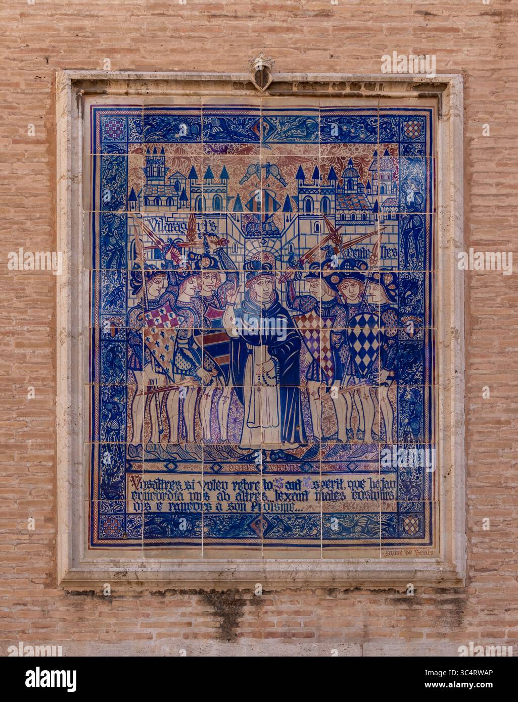 Un'immagine di una scena fatta di piastrelle sulla facciata esterna della Cattedrale di Valencia. Foto Stock