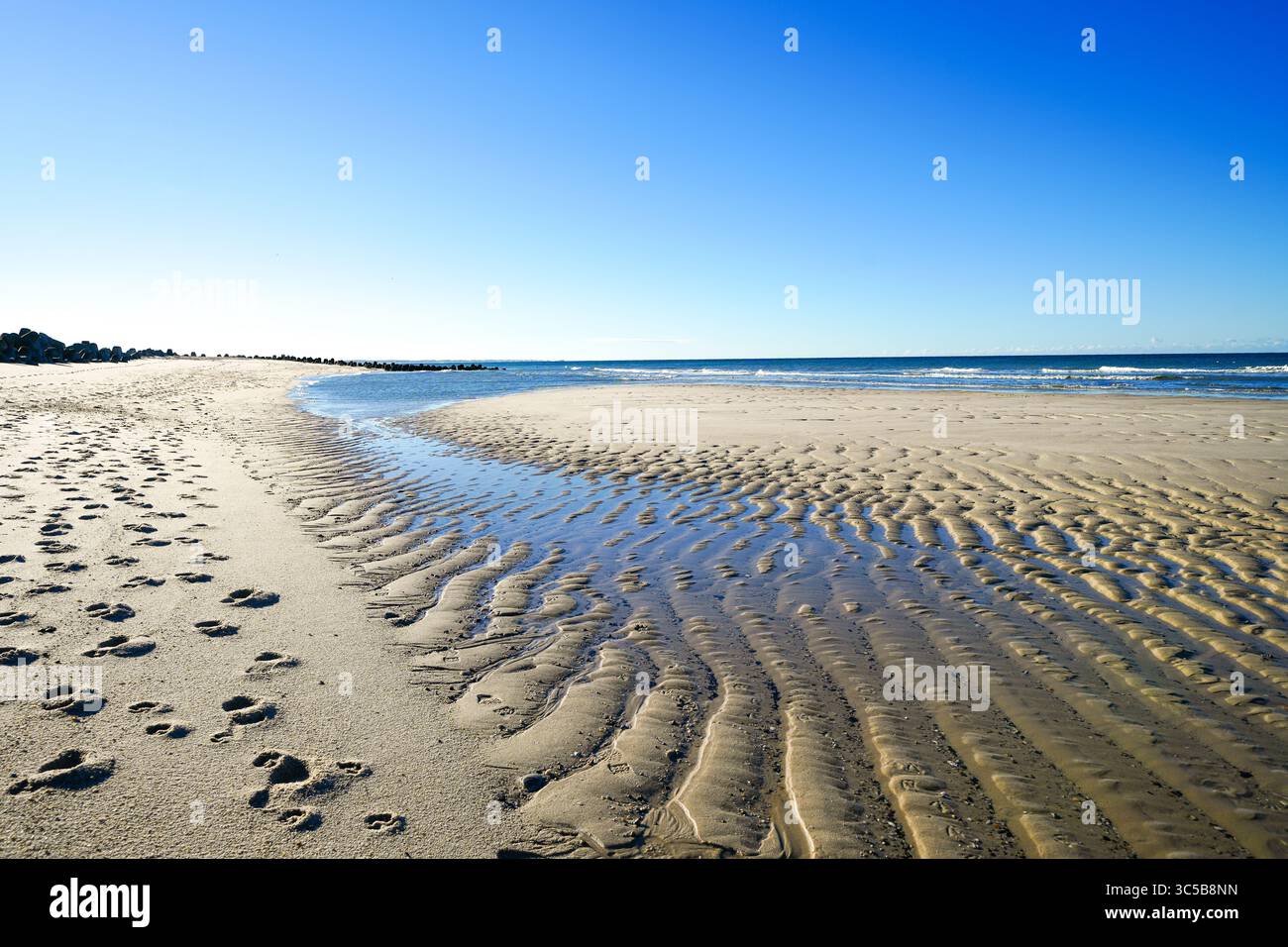 Paesaggio sulla spiaggia ovest vicino a Hörnum sull'isola di Sylt. Vista sulla costa del Mare del Nord. Foto Stock
