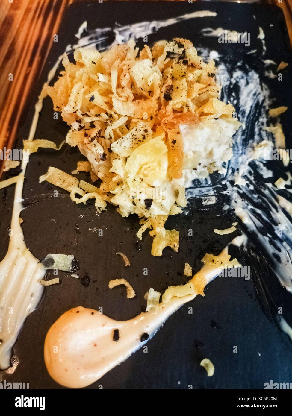 Gusta un pasto esclusivo in un ristorante spagnolo. Foto Stock