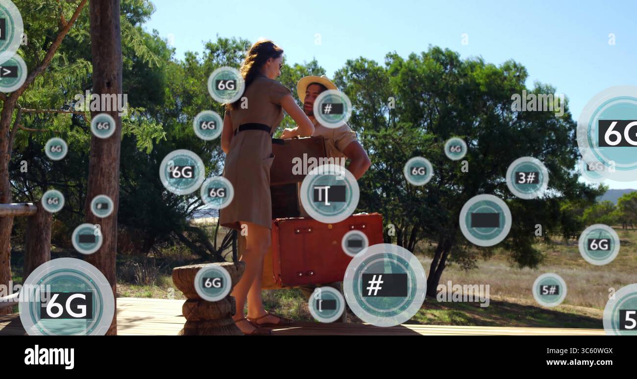 Sollevamento della valigia rossa, accoppiamento del cassone di legno su una piattaforma di legno, con icone 6G galleggianti Foto Stock