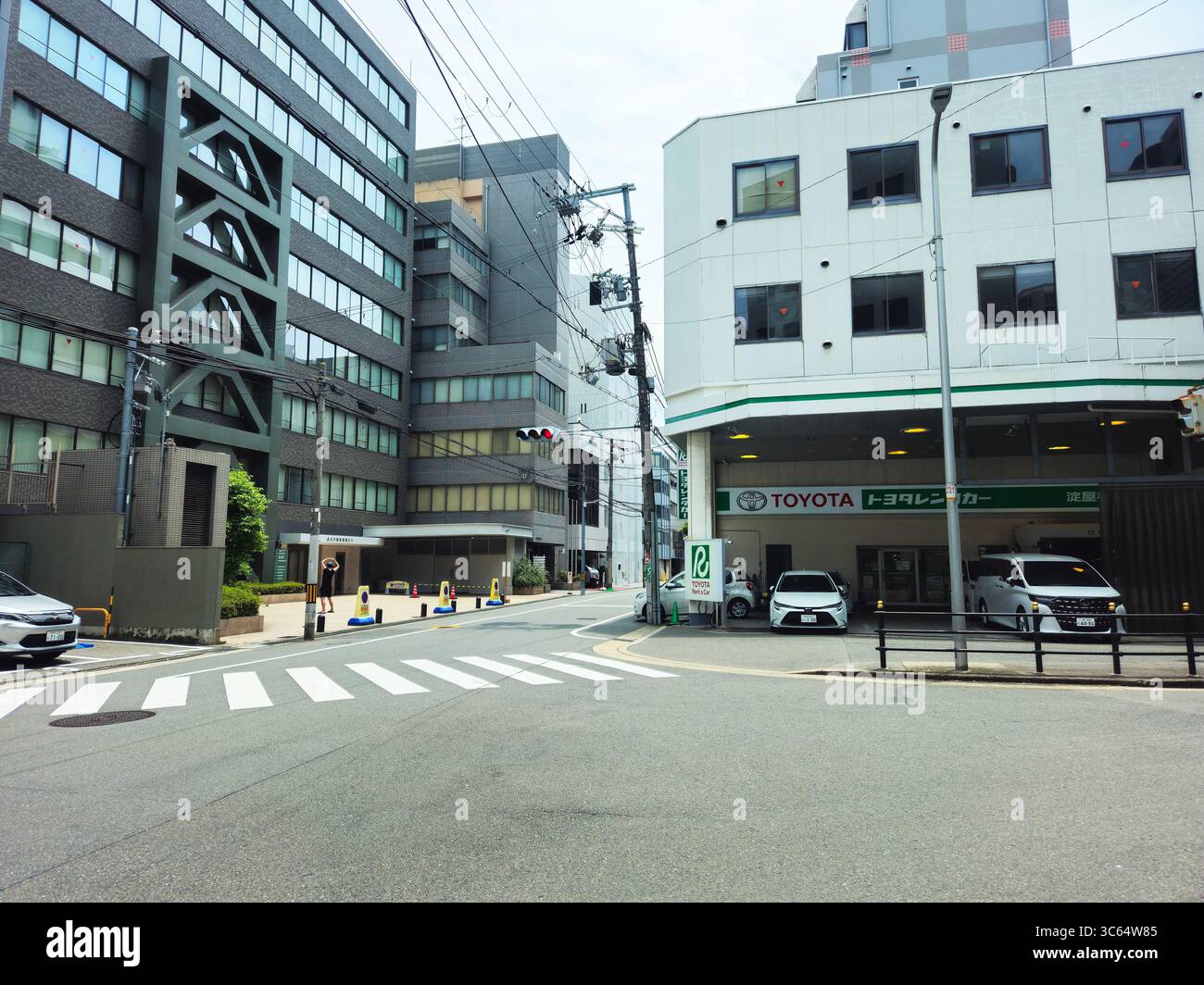 Toyota Rent-a-Car Corner in Yodoyabashi Business Street, Osaka, Giappone Foto Stock