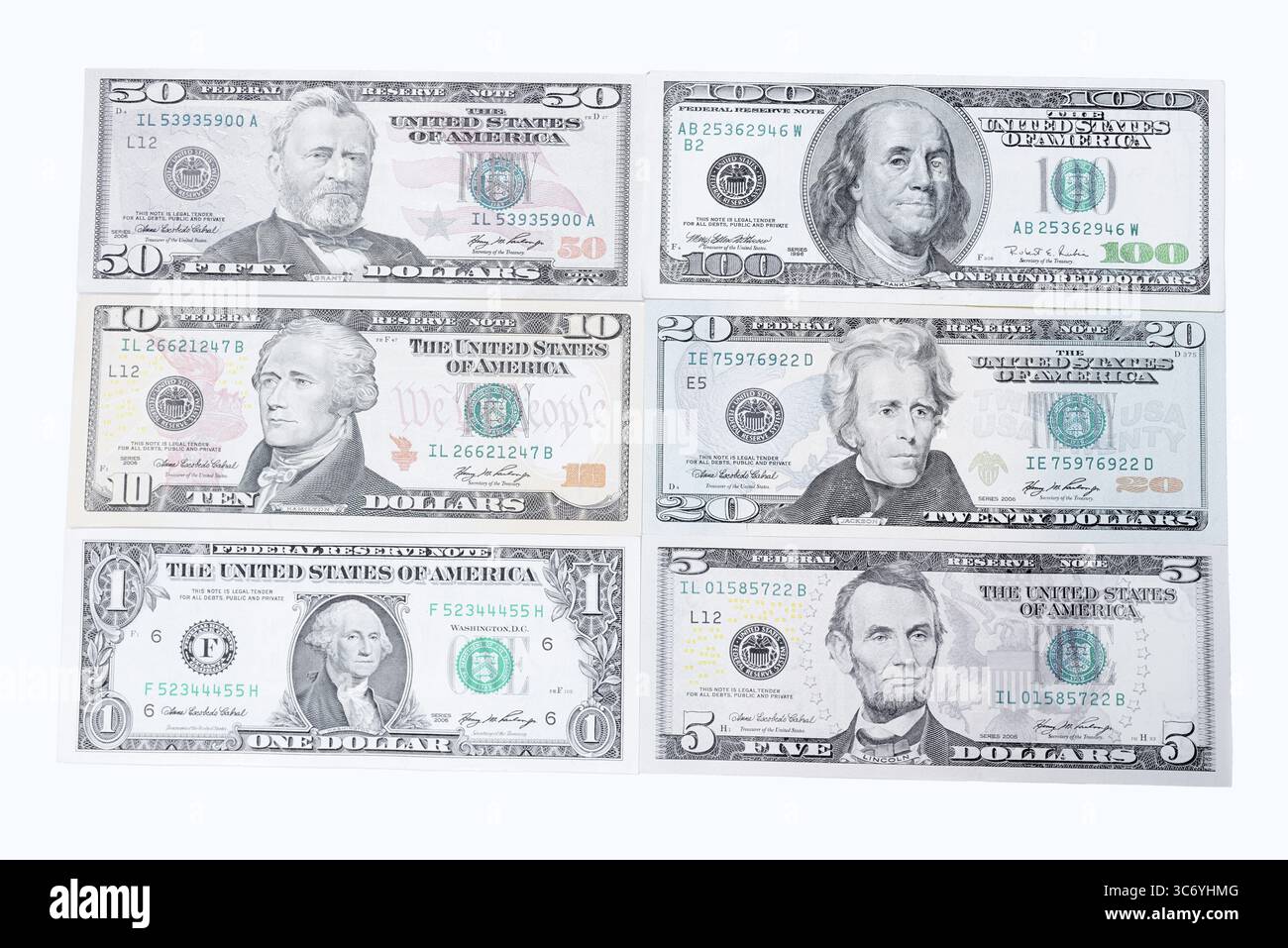Varie banconote in dollari USA su sfondo bianco, 1 dollaro, 5 dollari, 10 dollari, 20 dollari, 50 dollari, 100 dollari, banconote Foto Stock
