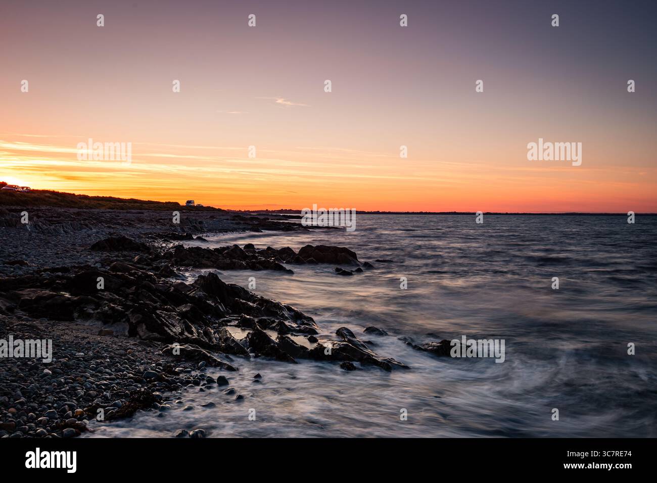 Tramonto sulla baia di Dundalk, Annagassan, Louth, Repubblica d'Irlanda Foto Stock