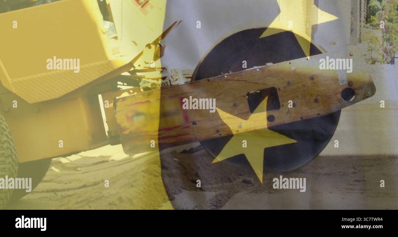 Compattatore vibrante giallo dominante con rullo del tamburo sullo sporco in loco, con sovrapposizione EU Stars Foto Stock