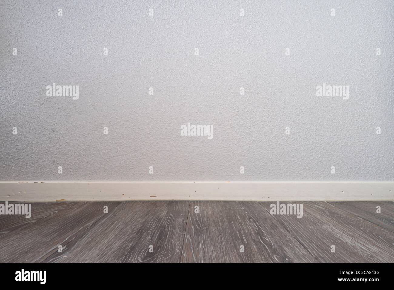 pavimenti in laminato e pareti in cartongesso per l'uso su sfondo Foto Stock