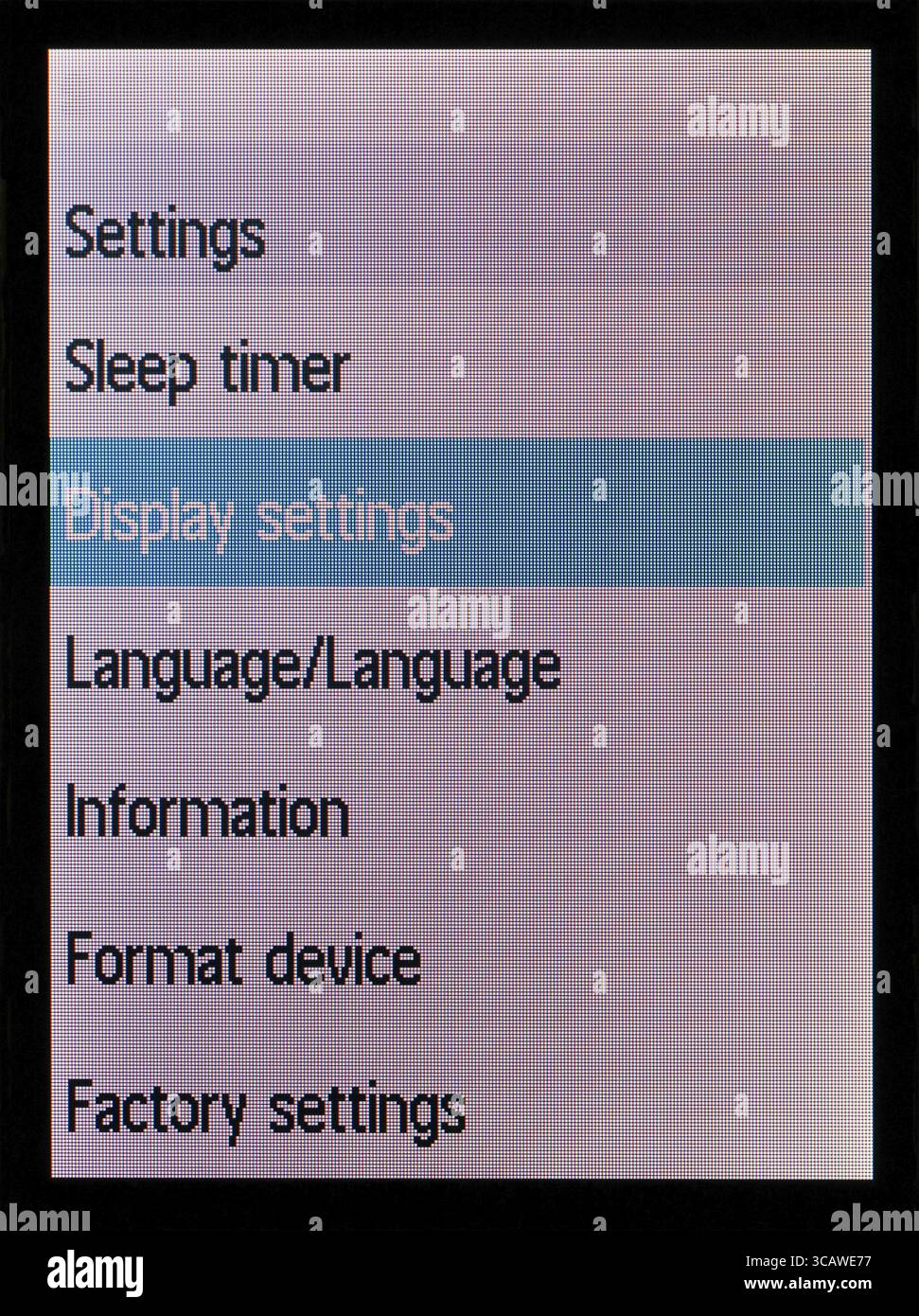 Schermo OLED di no nome audio player con il messaggio standard sulle impostazioni del display. Il rosso verde e blu di pixel e il sistema luminoso irregolare Foto Stock