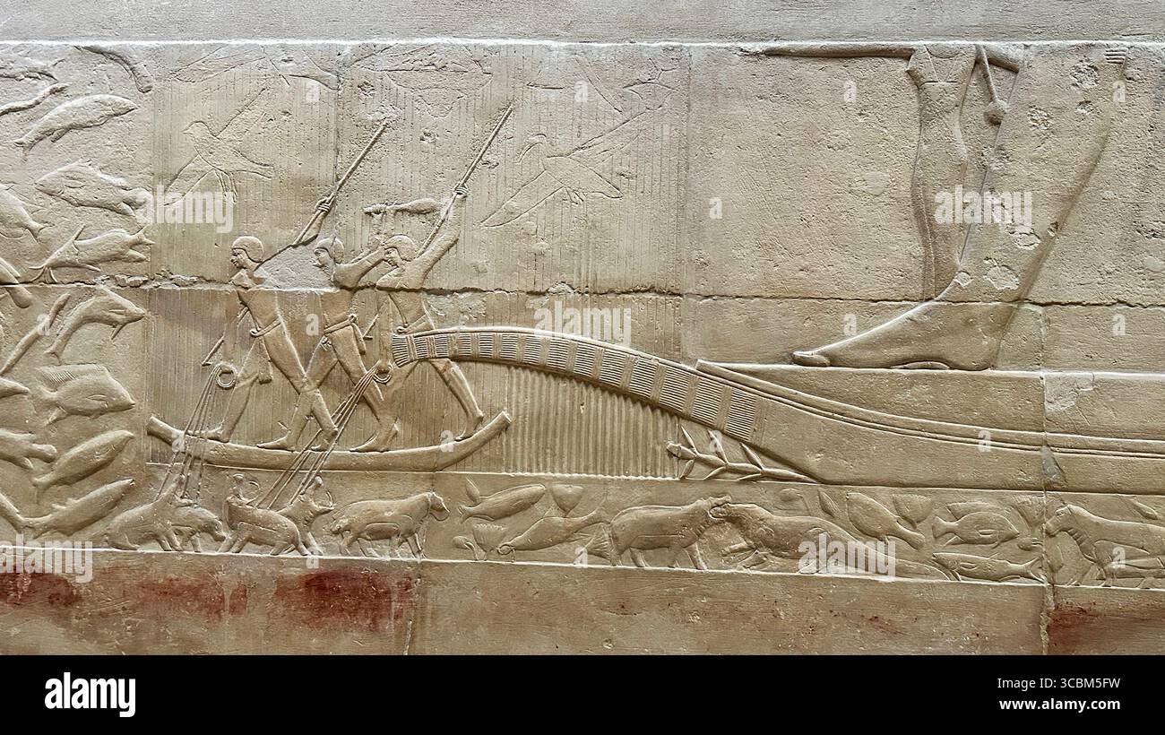 Sollievo dalla mastaba di Kagemni a Saqqara che mostra uomini che cacciano ippopotami Foto Stock