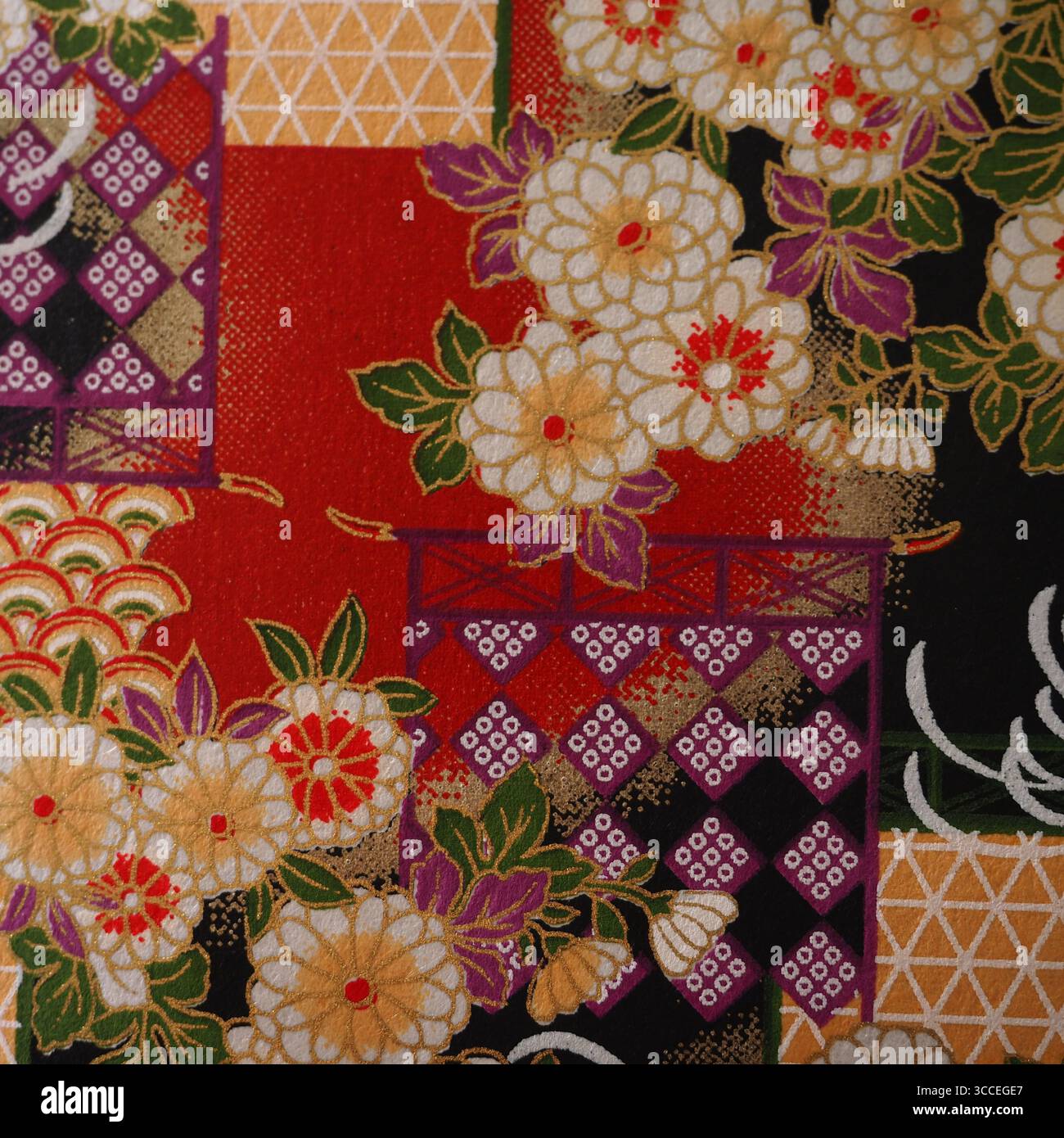 Motivo tessile giapponese tradizionale con disegni geometrici e floreali Foto Stock