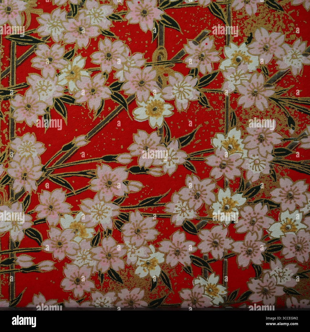 Motivo floreale giapponese tradizionale su sfondo rosso Foto Stock