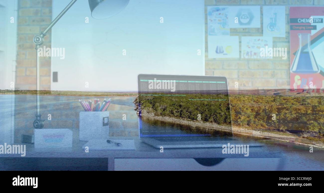 Laptop aperto che visualizza il codice nello spazio di lavoro dell'ufficio, con poster sulle sostanze chimiche e sovrapposizione sul lungofiume Foto Stock Laptop aperto che visualizza il codice nello spazio di lavoro dell'ufficio, con poster sulle sostanze chimiche e sovrapposizione sul lungofiume Foto Stock