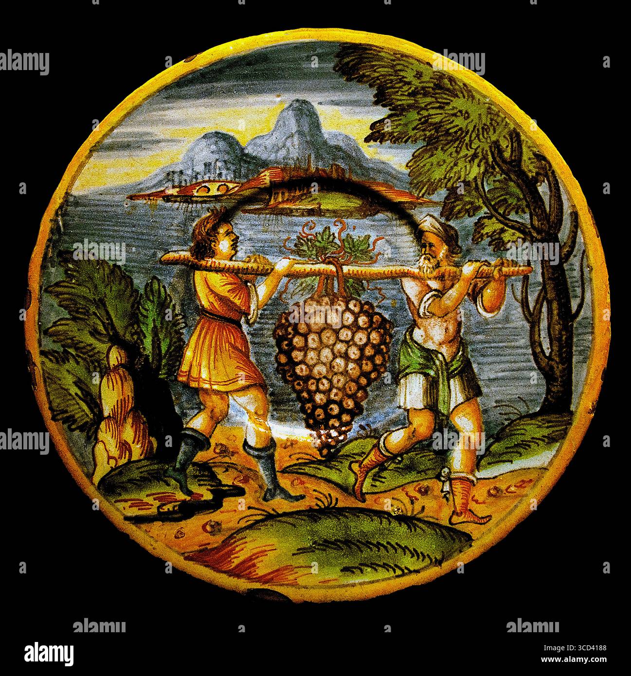 Il mazzo di targhe di Canaan o la Terra promessa 1641 Francia Museo francese di terracotta di Nevers Francia. (La frase "mucchio di Canaan" si riferisce alla storia biblica delle spie inviate a scovare la Terra promessa di Canaan, dove tornarono con un enorme mucchio di uva trasportato su un palo. Questa immagine è spesso raffigurata su lastre di elemosina o da collezione, in particolare quelle del XVI e XVII secolo. La "Terra promessa" si riferisce alla terra di Canaan, che Dio promise ad Abramo e ai suoi discendenti nella Bibbia ebraica. Foto Stock